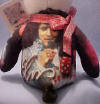 The Back of each Elvis Presley Teddy Bear is also detailed with pictures, movie or concert related paintings