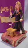 Hermione Storyteller Figurine is hand numbered and comes with a rotating viewer in the base.  There are 17 frames in each viewer.  Below is the inside of one of the viewers.  4 1/2 inches high 2 3/4 inches deep and 2 inches wide