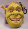 Shrek the Orge Treasure Keeper  The back of Shrek's head opens when you squeeze the sides Store coins or treasures inside!  4 inches
