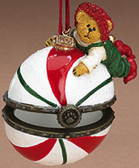 Boyds Kringlebeary's Christmas Ornaments Peppermint Hinged Treasure Box 
- introduced Fall 2005 and has been retired
- Our lil' holiday friend hangs onto this hinged boxshaped like a big ol' peppermint. Features golden 2005 dated tag. There is a surprise mini peppermint inside.
- Golden tag is dated with 2005
- includes the original box
