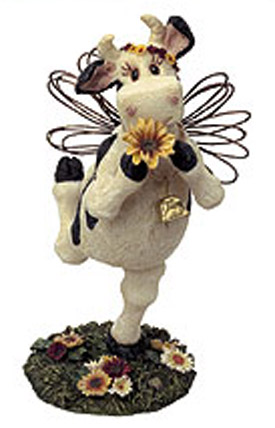 Boyds Holy Cows Daisey with Wings and Daisies - (introduced Spring 2003 and has been retired)  Daisey is skippin' along, singin' a song, and sniffin' a sweet daisy she just picked in the field. This bovine beauty is set on a spring, features wire wings, and rests atop a sculpted grass base.  Bottom of Cow reads:  "Everything has beauty, but not everyone sees it." - Confucious  5 inches high