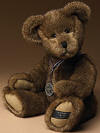 Boyds 25th Anniversary Exculsive Sterling Teddy Bear - (introduced in Fall 2004 as an exclusive and it has been retired) The Folks at Boyds are celebrating 25 Years of Making Friends with a spectacular anniversary piece! Meet Sterling, a mixed mocha bear that features a bit of bean filling in his belly, ultrasuede paw pads, and a special anniversary label on his foot pad. He wears a 25th anniversary medallion with patriotic ribbon hanger. A must-have for any True Blue Boyds collector! Thanks to the thousands of Boyds Collectors who participated in our online challenge and helped us name this precious bear! 16 inches and poseable