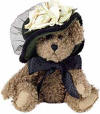 Boyds Teddy Bear Monique LaBearsley -  (introduced Fall 2001 and has been retired)  For evenings on the town, coffee chenille bear Monique sports a wool chapeau with net veiling and cabbage rose.  6 inches and poseable