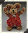 Boyds Andrew Huntington Mocha Teddy Bear-  (introduced Fall 1999 and has been retired)  Tonight's the night to go hunting for the Great Pumpkin...and Andrew is all set to blend into the colors of the Punkin Patch. With his handsome coffee-colored chenille and his cut-velour overalls in a luscious Orange Spice shade, he'll be able to sneak up on his quarry before you can say "Boo!" There will be a beautifully carved centerpiece on tomorrow's table...we hear Andrew is quite the young Artist.  6 inches and posesable