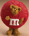 Boyds Bearstones Candy Peeker Red M & M Figurine - (introduced Fall of 2005)  Everyone knows Red is the leader of the pack, but perhaps no one knows it more than this "M&M'S®" lovin' bear! He's dressed up in a special peeker costume (check out the zipper on the back) that honors his favorite "M&M'S®" Brand Character of all...Red! He's even got the confident attitude to go along with it!  4 inches