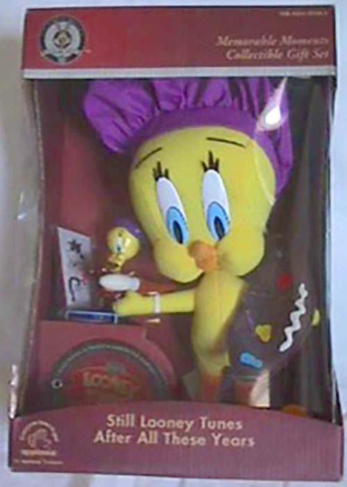 "Tweety's Memorable Moments" Plush Artist Tweety with Limited Edition Figure
- made by Applause 
- Depicted is a Memorable Moment from their playful hit "Trip for Tat" in which Tweety's artistic side is evident. Our fine feathered "widdle" friend dons a painters smock, brush and palette to capture the true essence of a "puddy tat" - as seen through the eyes of a mischievous bird! Designed as a special boxed gift set and unique collectible, and in our soft, playful "personality plush," this Memorable Moment can serve double duty - as a whimsical toy or figural showpiece that's Still Looney Tunes After All These Years!