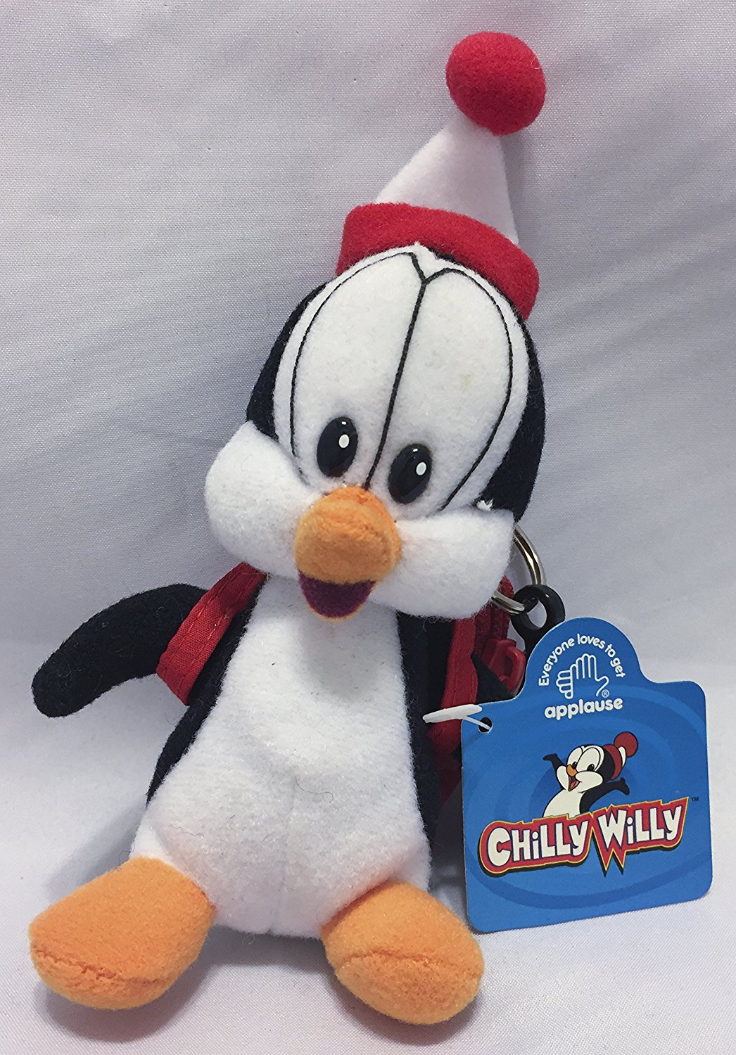 The adorable penguin Chilly Willy has been made into a keychain clip on. His little backpack can hold change or small treasures.