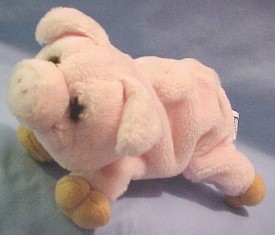 Wilfred Pig is an adorable plump cuddly soft pig, created with Lou Rankin's trademark life like eyes and expression.