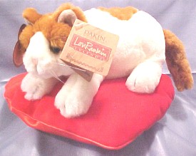 Lou Rankin designed adorable Valentine's Day cuddly soft plush stuffed animals.  Sasha the Cat, Charly the Cocker Spaniel and Higgens the Sheepdog all resting upon heart shaped pillows.