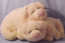 Lifelong friends Wilfred and his friend are cuddly soft pigs. Made by Dakin they were designed by Lou Rankin for his Lifelong Friends plush collection.