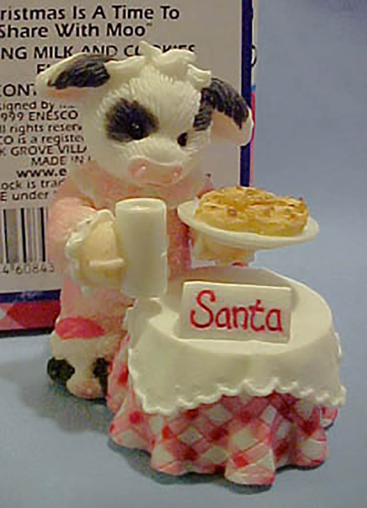 Mary Moo Moos Cow Christmas Figurine "Christmas Is A Time To Share With Moo"
- made by Enesco and retired in April 2000