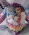 The Back of each Elvis Presley Teddy Bear is also detailed with pictures, movie or concert related paintings