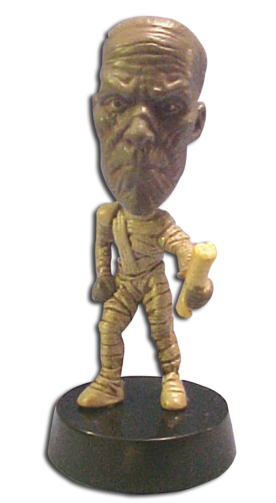Don't be afraid of the Dark these monsters will not harm you!  From Universal Studios back lots we have The Mummy in a Bobble Head!
