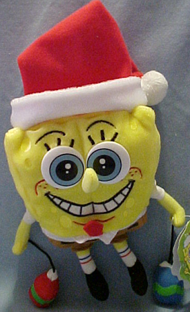 Nickelodeon's SpongeBob Square pants and Patrick the Starfish are dressed up for Christmas wearing Santa hats and holding Christmas items.