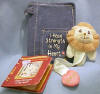 Precious Moments Daniel's Lion with New Testament - Blue Jean book cover holds New Testament Psalms.
