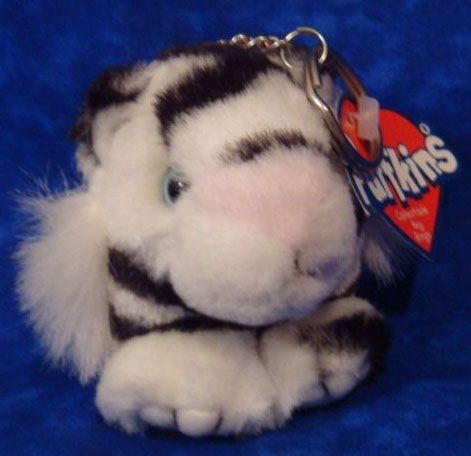 Puffkins Lions, Tigers, and Leopards as adorable little plush key chains.