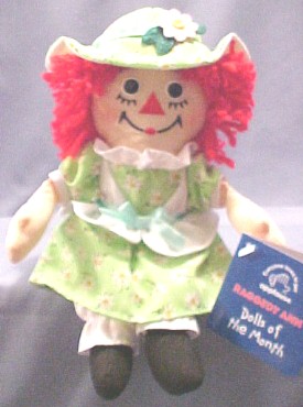 Raggedy Ann is all dressed up for each month of the year! Wearing a coat and muff for December, a maroon jumper for February, holding a kite for March, wearing a daisy patterned dress for May, in an old fashioned bathing suit for June, in a yellow and white striped dress for August, ready for back to school for September, decorated with colored leaves for October, carrying a Gingerbreadman for November, and in a satiny green dress for December.