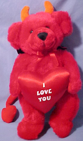 Russ Berrie Plush Dante Red Devil Bear with Heart
- Dante is his name Love is his game! He has little orange horns sticking up by his furry red ears. He is wearing a silky red and black cape tied with a silky red ribbon around his neck. Dante has a LONG red Devil tail. In his arms he carries a red satiny heart with I LOVE YOU written on it. 
- Dante was made by Russ Berrie in 1998.